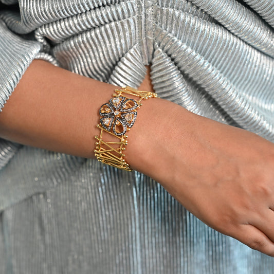 Golden Cuff Bracelet With Flower