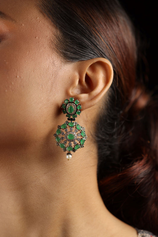 Green gemstone dangler style earring