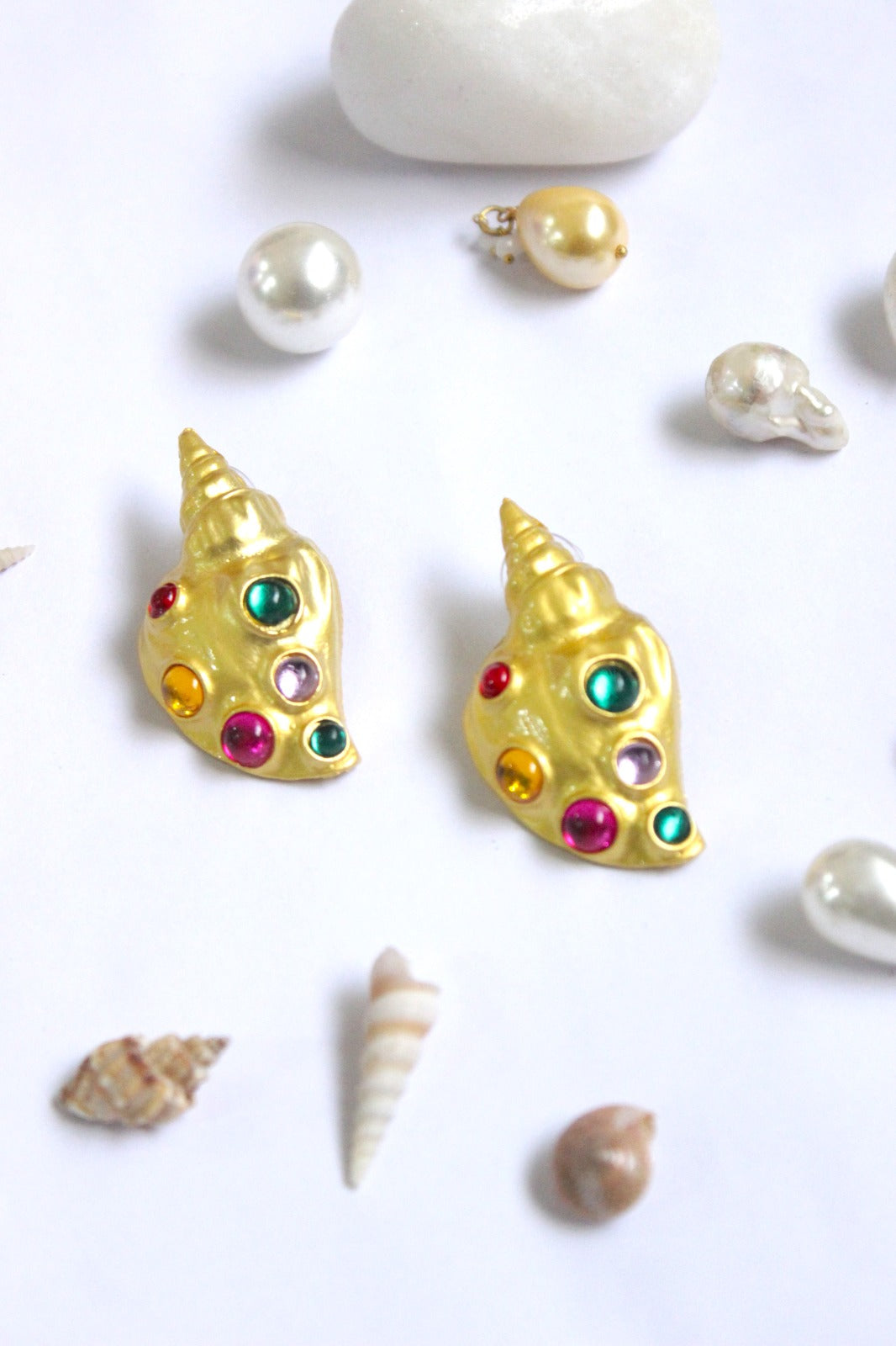 Gold-colored conch shell earrings