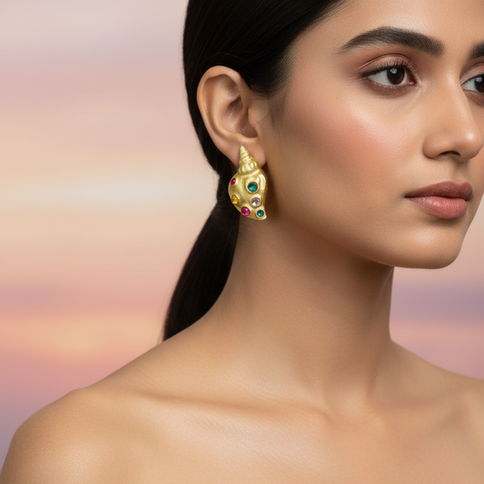 Gold-colored conch shell earrings
