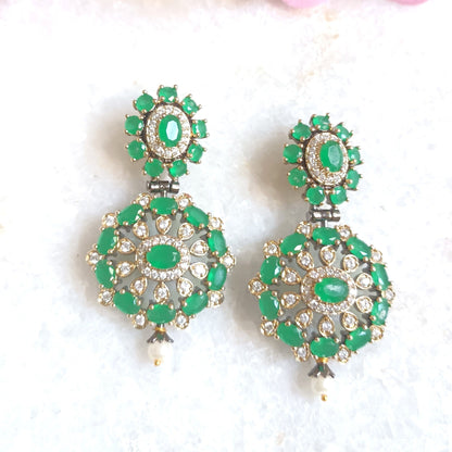 Green gemstone dangler style earring