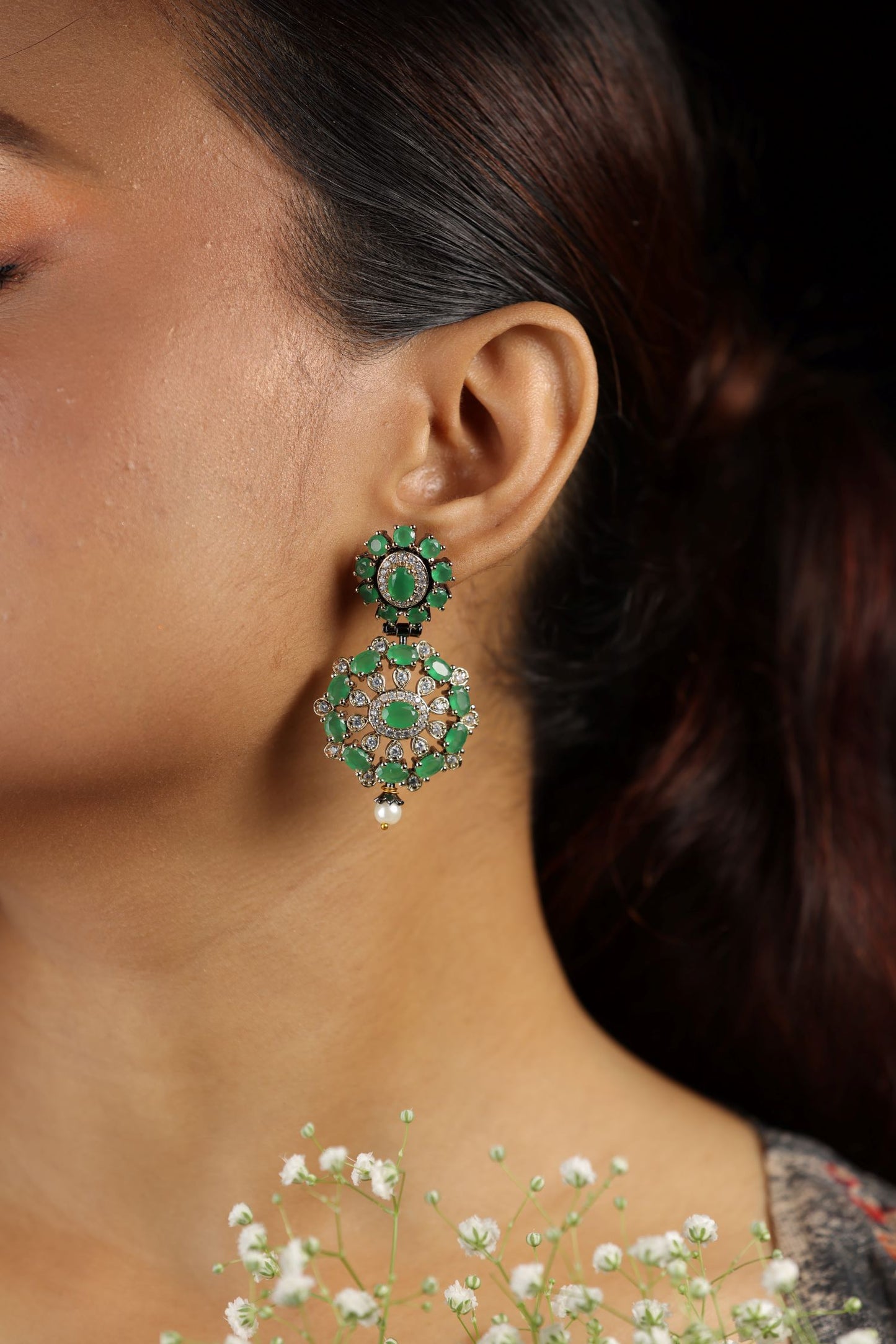Green gemstone dangler style earring