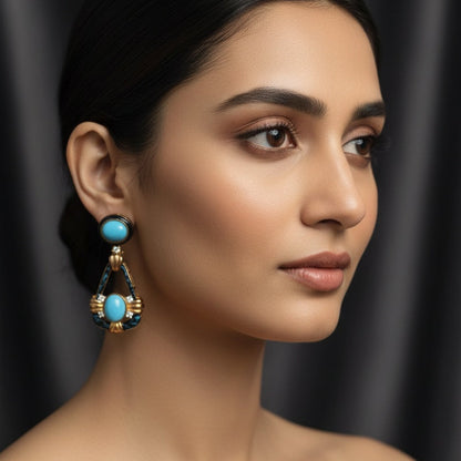 Teardrop shape earring with Egyptian motifs