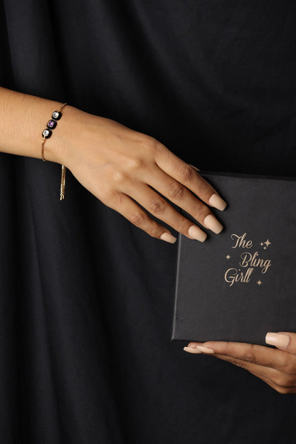 Delicate chain design bracelet with three bezel set stones