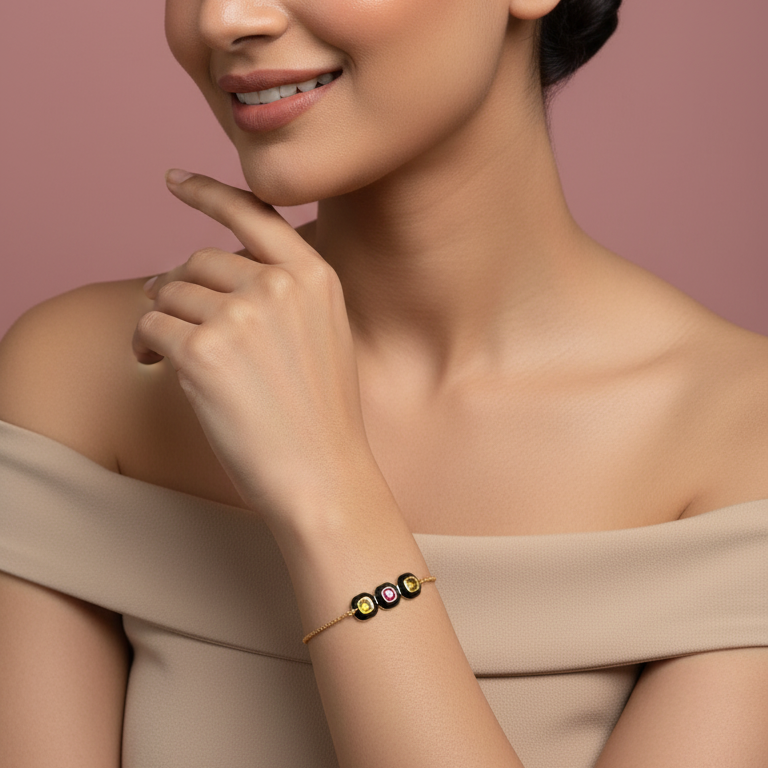 Delicate chain design bracelet with three bezel set stones