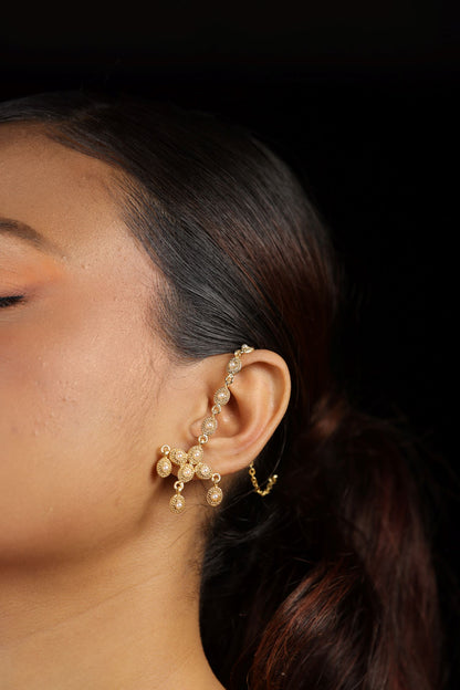 Jhumka style earring with oval shaped elements adorned with small pearl